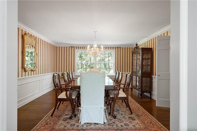 1061 Apple Hill Ln, Mccandless, PA 15101 - dining space featuring wood finished floors, a chandelier, crown molding, and a decorative wall