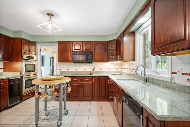 1061 Apple Hill Ln, Mccandless, PA 15101 - kitchen with black appliances, light stone counters, tasteful backsplash, glass insert cabinets, and light tile patterned flooring