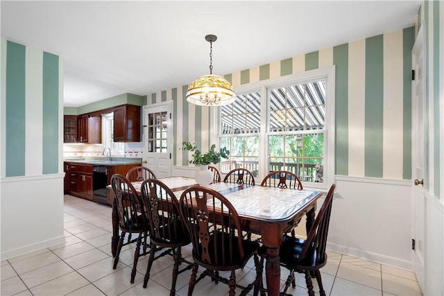 1061 Apple Hill Ln, Mccandless, PA 15101 - dining space with wallpapered walls, a wainscoted wall, light tile patterned flooring, and a chandelier