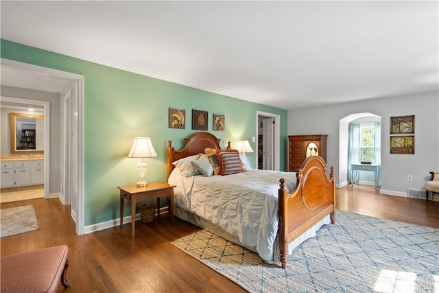 1061 Apple Hill Ln, Mccandless, PA 15101 - bedroom with wood finished floors and arched walkways
