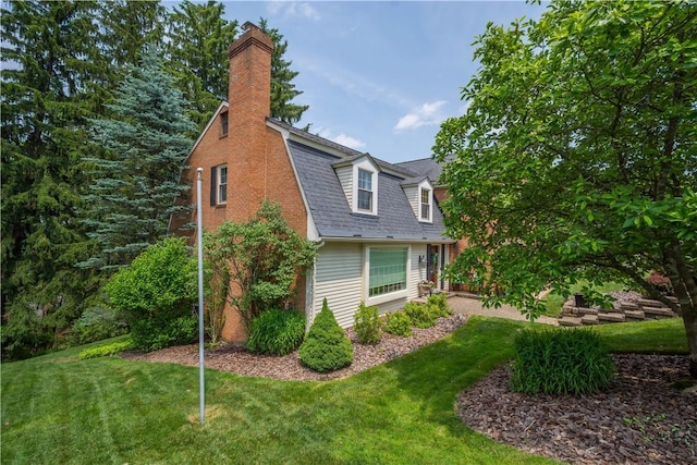 1061 Apple Hill Ln, Mccandless, PA 15101 - view of home's exterior with a yard, a chimney, and a gambrel roof