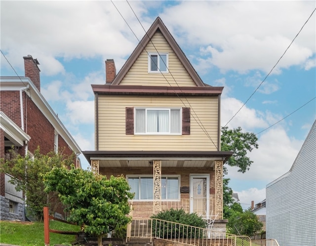2509 Spring St, Arlington, PA 15210 - view of front of property featuring a porch and a fenced front yard