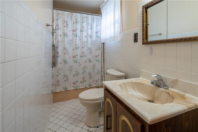 2509 Spring St, Arlington, PA 15210 - full bathroom with tile walls, vanity, and shower / bathtub combination with curtain