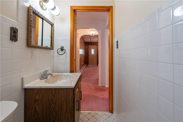 2509 Spring St, Arlington, PA 15210 - bathroom featuring tile walls and vanity