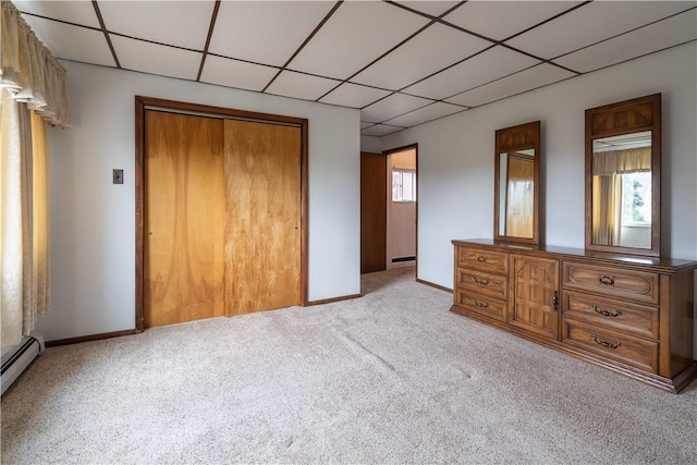 2509 Spring St, Arlington, PA 15210 - carpeted bedroom featuring a drop ceiling, a closet, and baseboard heating