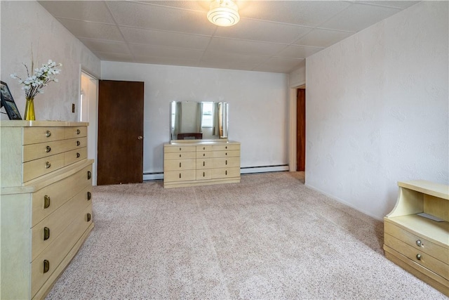 2509 Spring St, Arlington, PA 15210 - bedroom with baseboard heating, a paneled ceiling, and carpet floors