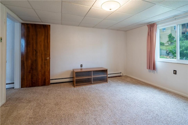 2509 Spring St, Arlington, PA 15210 - carpeted spare room with a baseboard heating unit, a drop ceiling, and baseboard heating