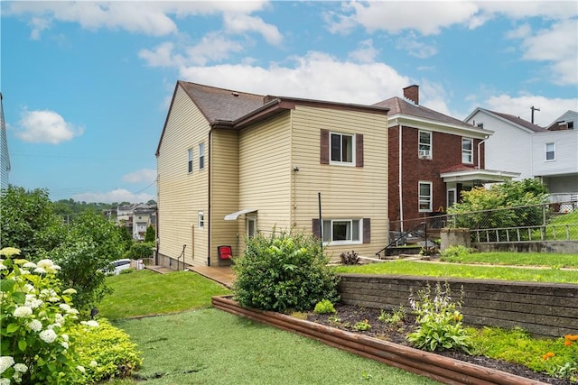 2509 Spring St, Arlington, PA 15210 - rear view of house featuring a chimney