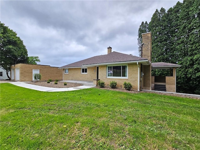 946 Herman Rd, Summit Twp But, PA 16002 - view of front of property with brick siding, a front lawn, and a chimney