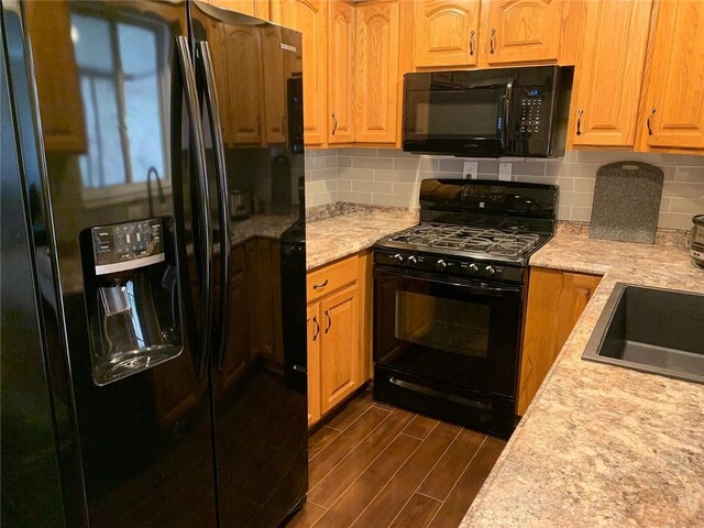 101 Stella Dr, Level Green, PA 15085 - kitchen with black appliances, decorative backsplash, and dark wood-style floors