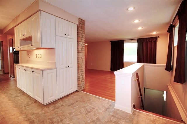 202 Dominican Way, Zelienople Boro, PA 16063 - kitchen with white cabinets, recessed lighting, oven, and light countertops