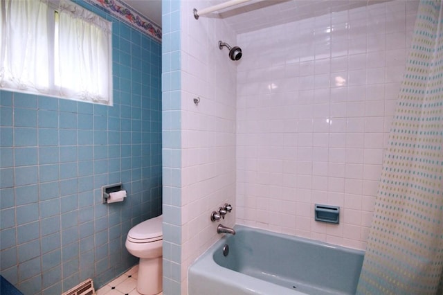 202 Dominican Way, Zelienople Boro, PA 16063 - bathroom with tub / shower combination, tile patterned floors, and tile walls