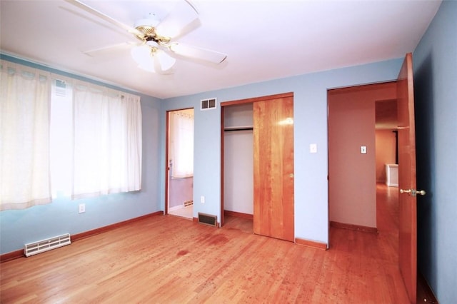 202 Dominican Way, Zelienople Boro, PA 16063 - unfurnished bedroom with two closets, light wood-type flooring, and ceiling fan
