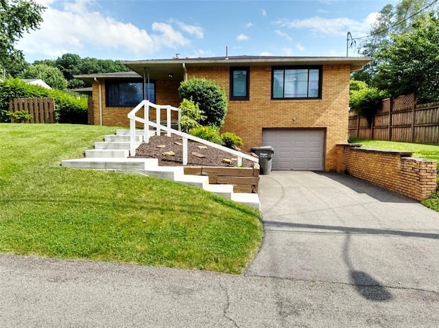 202 Dominican Way, Zelienople Boro, PA 16063 - ranch-style house featuring concrete driveway, an attached garage, and brick siding
