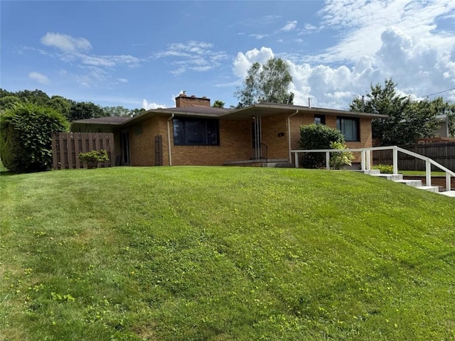 202 Dominican Way, Zelienople Boro, PA 16063 - back of house with brick siding and a chimney