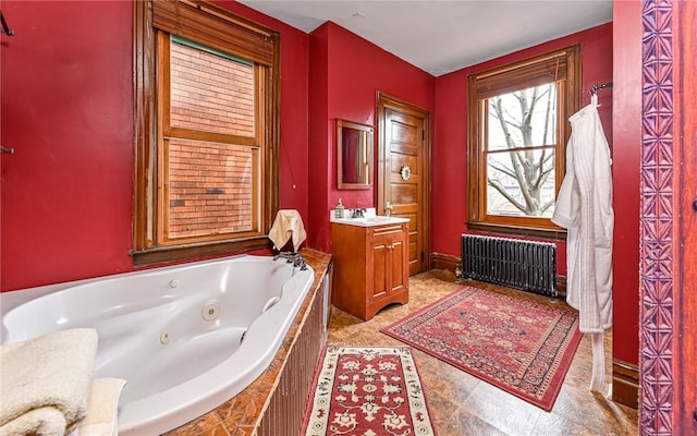 609 N Beatty, East Liberty, PA 15206 - full bath featuring radiator heating unit, a jetted tub, and vanity