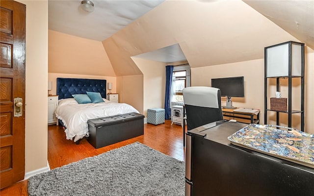 609 N Beatty, East Liberty, PA 15206 - bedroom with wood finished floors, vaulted ceiling, and a desk