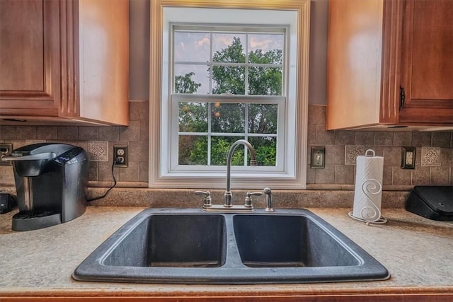 2616 Chalet Ln, South Park, PA 15129 - kitchen featuring brown cabinets, light countertops, and tasteful backsplash