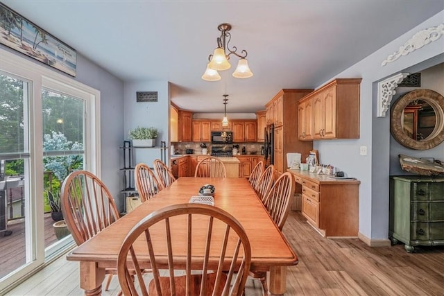 2616 Chalet Ln, South Park, PA 15129 - dining space featuring light wood finished floors and baseboards