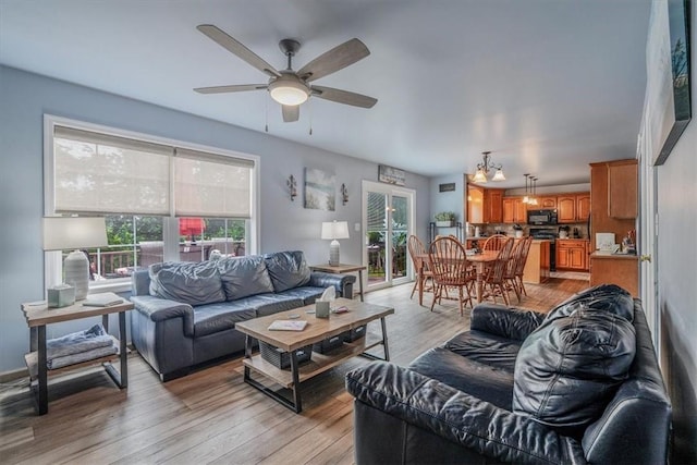 2616 Chalet Ln, South Park, PA 15129 - living area with a ceiling fan and light wood-style floors
