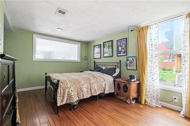3105 Brereton St, Lawrenceville, PA 15219 - bedroom with hardwood / wood-style flooring and baseboards