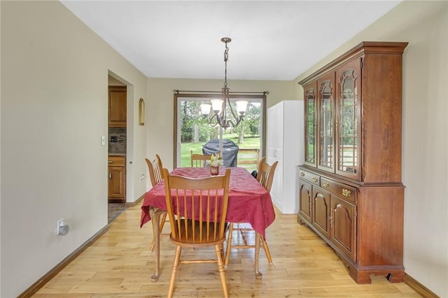 285 Old Plank Rd, City Of But Se, PA 16002 - dining area with a chandelier and light wood-type flooring