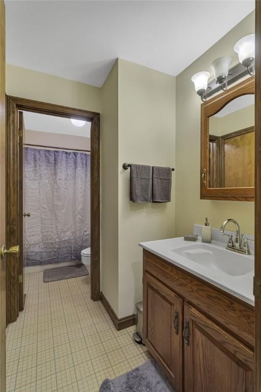 285 Old Plank Rd, City Of But Se, PA 16002 - full bath with vanity and a shower with shower curtain