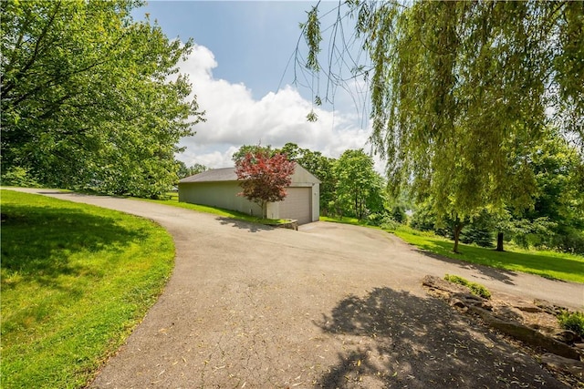 10737 Babcock Blvd, Pine Twp Nal, PA 15044 - exterior space with a detached garage and a lawn
