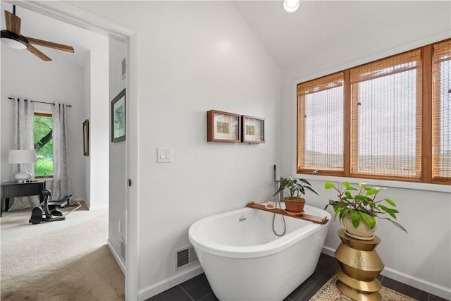 10737 Babcock Blvd, Pine Twp Nal, PA 15044 - bathroom featuring a soaking tub, lofted ceiling, and ceiling fan