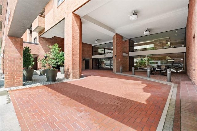 307 S Dithridge St Unit 207, Oakland, PA 15213 - lobby with a towering ceiling and brick wall