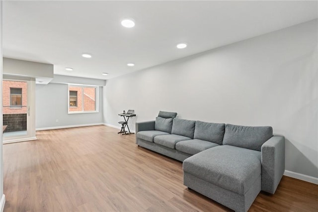 307 S Dithridge St Unit 207, Oakland, PA 15213 - living room with wood finished floors and recessed lighting