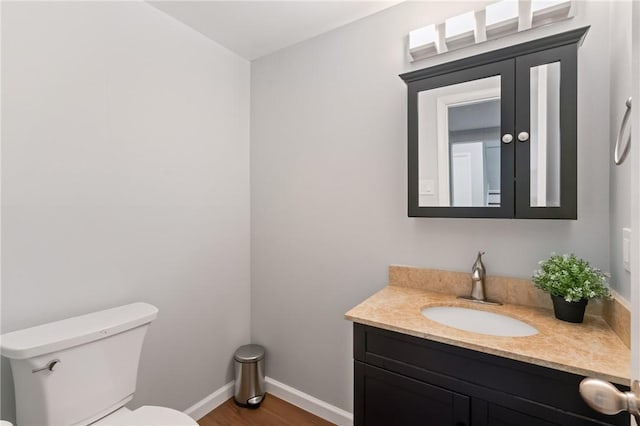 307 S Dithridge St Unit 207, Oakland, PA 15213 - half bath featuring vanity and wood finished floors
