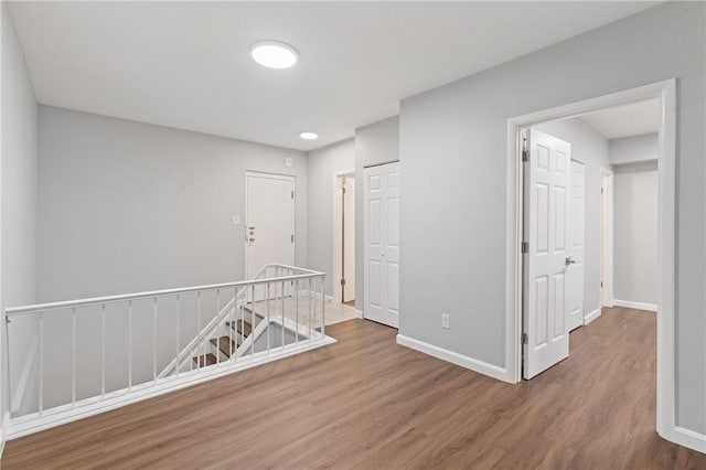 307 S Dithridge St Unit 207, Oakland, PA 15213 - hallway featuring an upstairs landing and wood finished floors