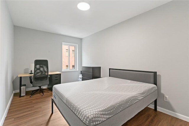 307 S Dithridge St Unit 207, Oakland, PA 15213 - bedroom featuring wood finished floors and a desk