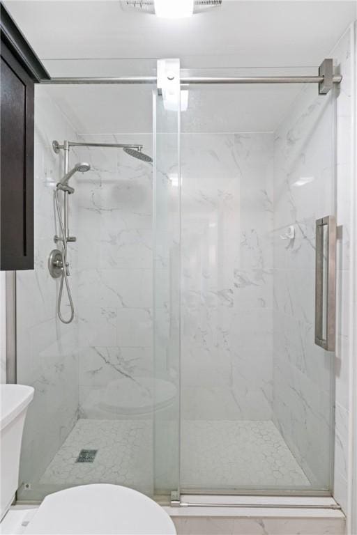 307 S Dithridge St Unit 207, Oakland, PA 15213 - bathroom with toilet and a marble finish shower