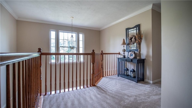 104 Cherokee Ct, Buffalo Twp But, PA 16229 - hallway featuring carpet flooring, ornamental molding, a chandelier, and an upstairs landing
