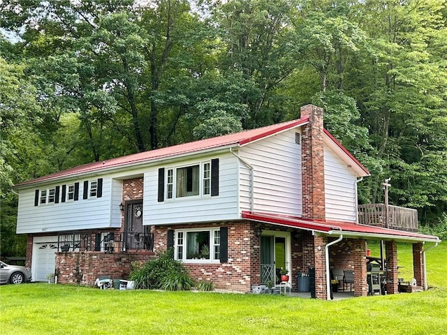 4627 Water Level Rd, Milford Twp, PA 15557 - raised ranch with a chimney, a front lawn, an attached garage, and brick siding