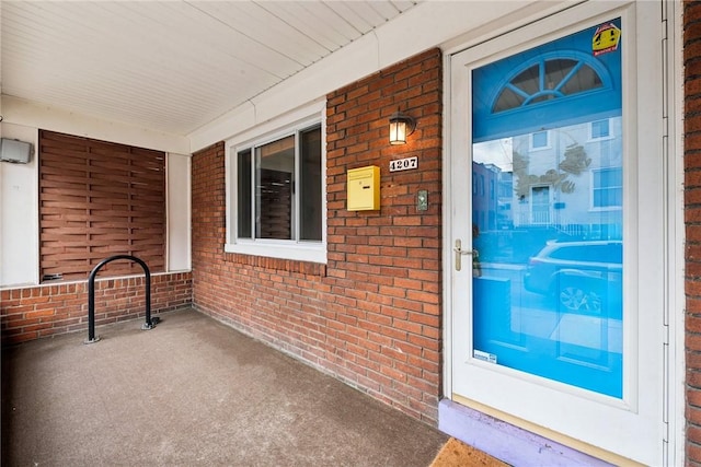 4207 Post St, Lawrenceville, PA 15201 - entrance to property with covered porch and brick siding