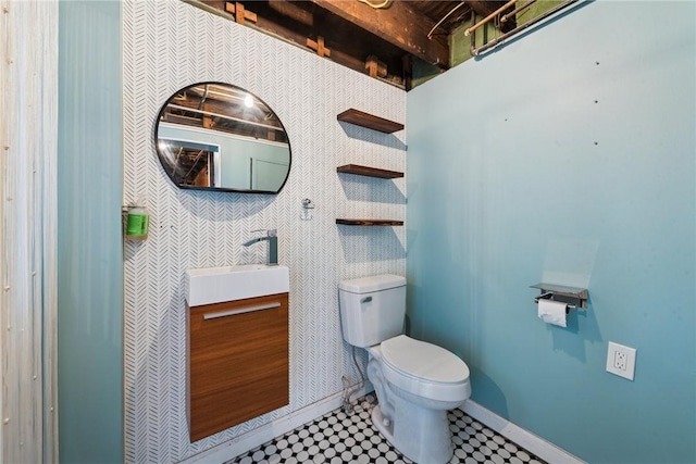 4207 Post St, Lawrenceville, PA 15201 - half bath with vanity, tile patterned floors, and wallpapered walls
