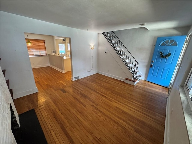 4207 Post St, Lawrenceville, PA 15201 - foyer featuring stairway and wood finished floors