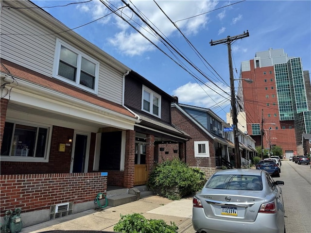 4207 Post St, Lawrenceville, PA 15201 - view of front facade featuring brick siding