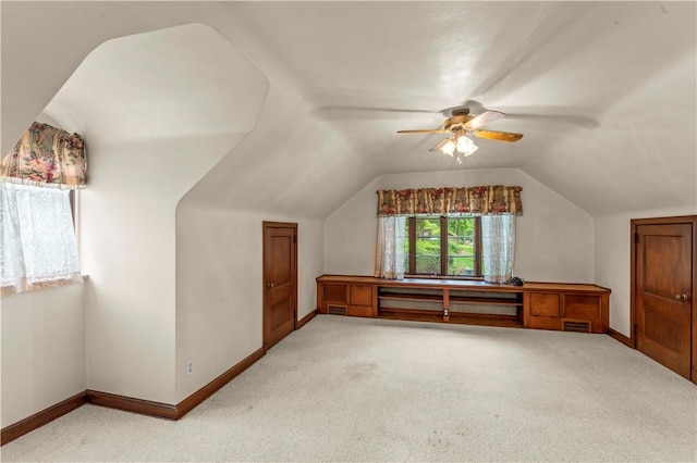 35 Redstone Ln, City Of Washington, PA 15301 - additional living space with light colored carpet, lofted ceiling, and ceiling fan