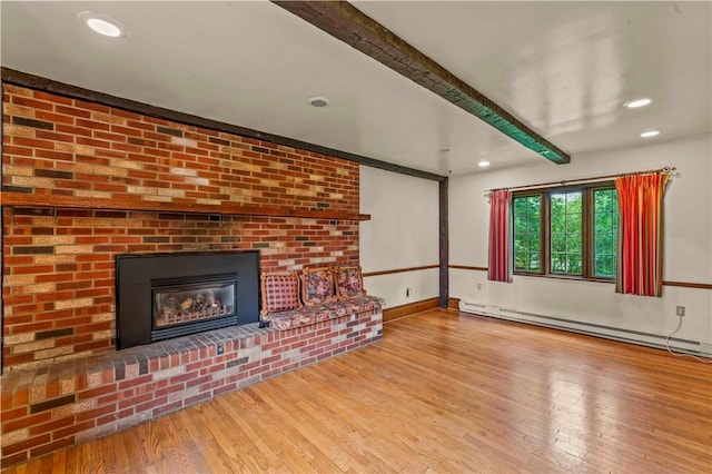 35 Redstone Ln, City Of Washington, PA 15301 - unfurnished living room with a baseboard radiator, wood finished floors, beamed ceiling, a brick fireplace, and recessed lighting