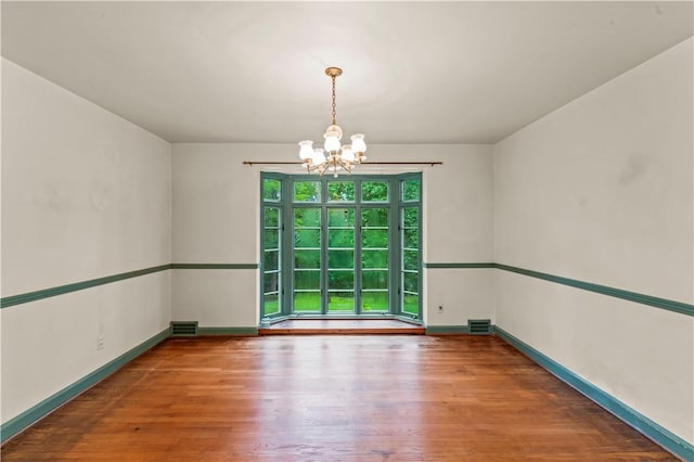 35 Redstone Ln, City Of Washington, PA 15301 - unfurnished room featuring a chandelier and wood finished floors