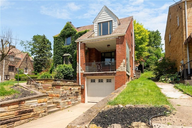 2401 Valera Ave, Carrick, PA 15210 - view of front of property featuring brick siding, a garage, a balcony, and concrete driveway