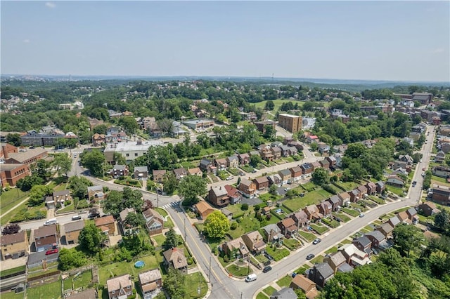2401 Valera Ave, Carrick, PA 15210 - aerial overview of property's location with nearby suburban area and a tree filled landscape