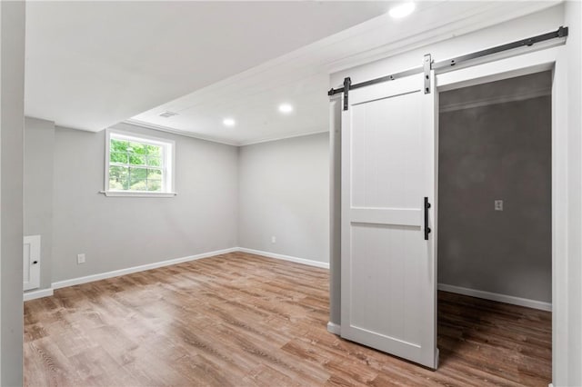 117 Heather Dr, Center Twp Bea, PA 15061 - basement featuring a barn door, wood finished floors, recessed lighting, and crown molding