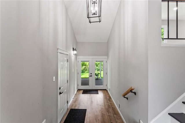 117 Heather Dr, Center Twp Bea, PA 15061 - doorway with wood finished floors, a chandelier, and french doors