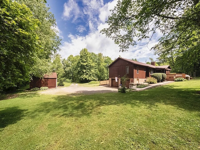 4779 State Route 819, Bell Twp, PA 15613 - view of grassy yard with a deck