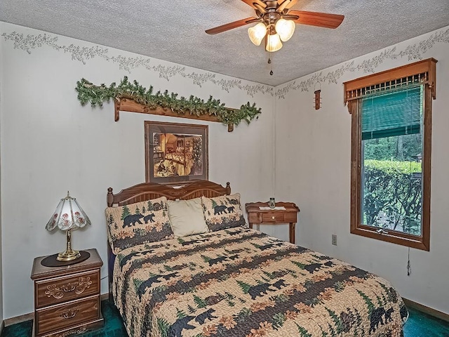 4779 State Route 819, Bell Twp, PA 15613 - carpeted bedroom with a textured ceiling and ceiling fan